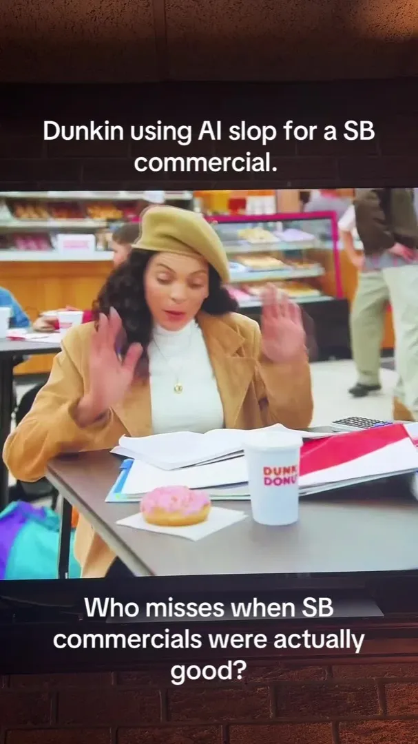 Fotograma del vídeo de TikTok de @twohumanstoomanyanimals comentando los anuncios de la Super Bowl 2026 con el rótulo AI slop detected